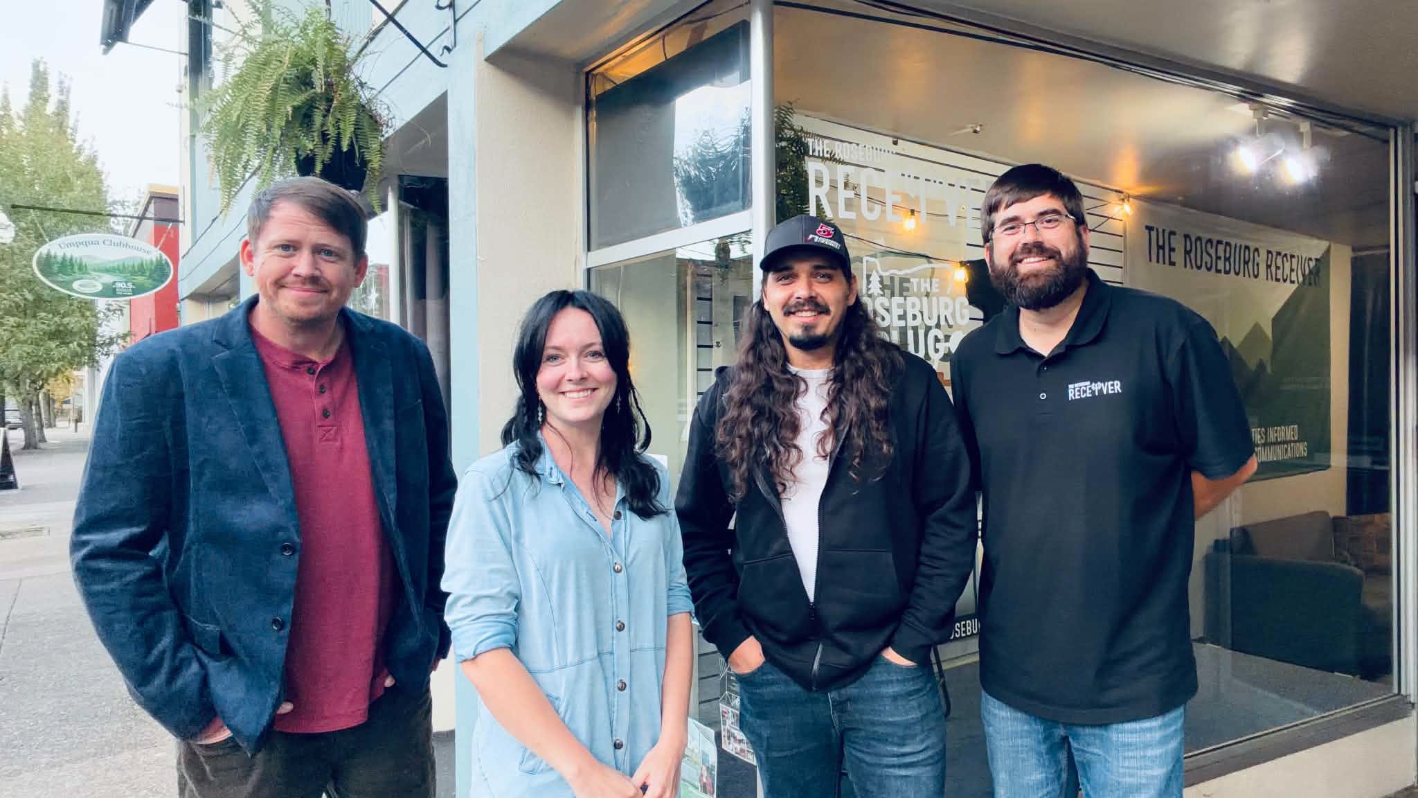 The Roseburg Plug and Roseburg Receiver teams outside their downtown Roseburg studio